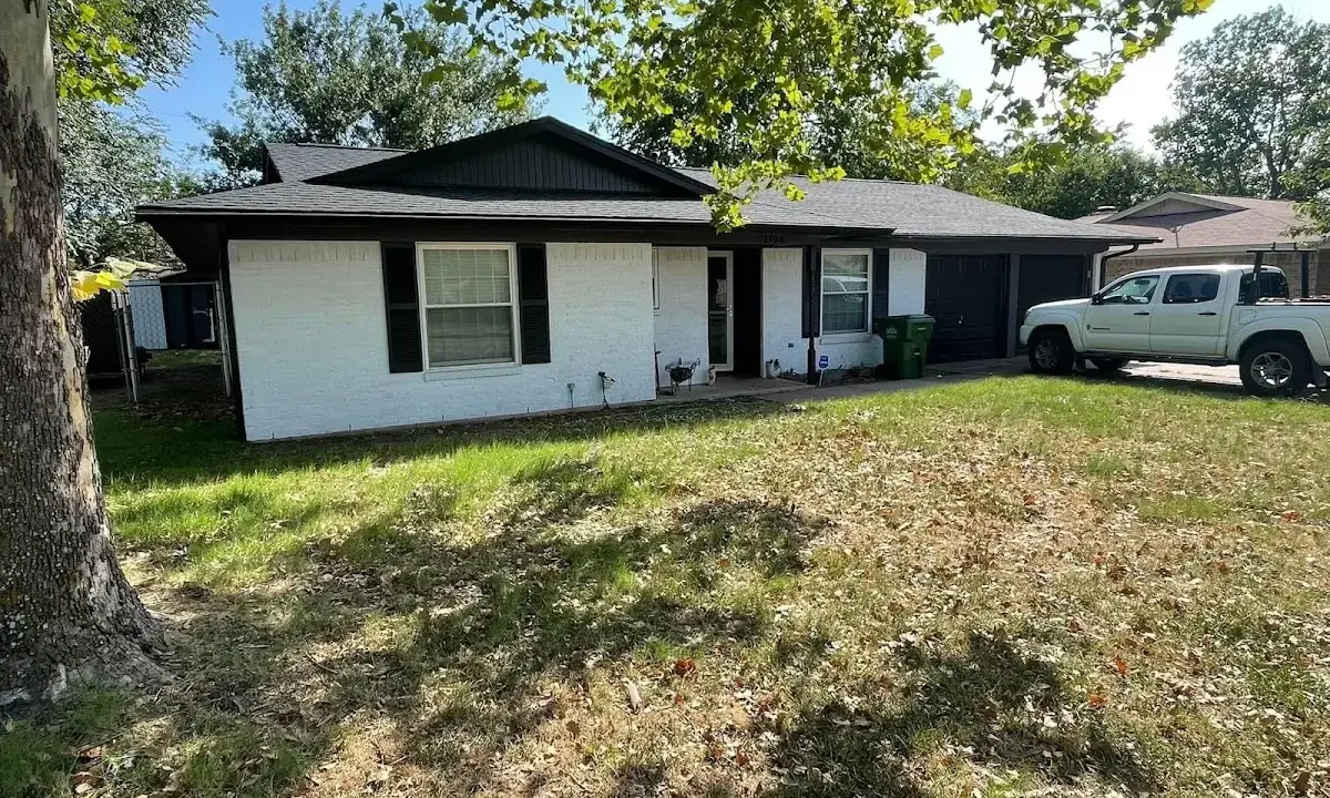 Professional roofing crew working on a residential roof in San Tan Valley